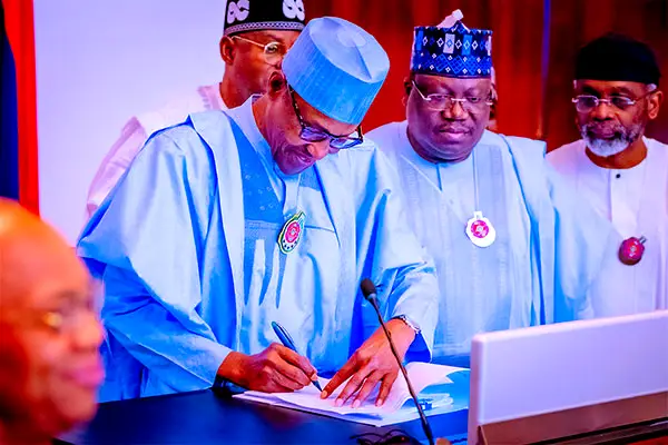 BREAKING: Buhari signs 2023 budget into law